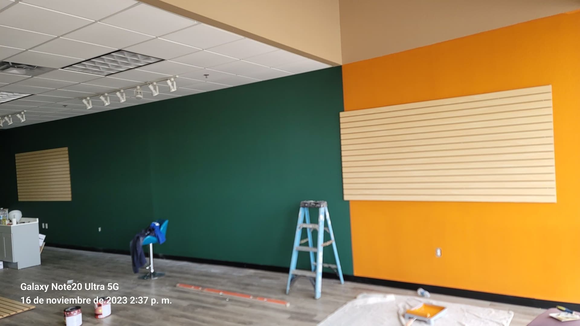 Interior room with finished green and orange painted walls
